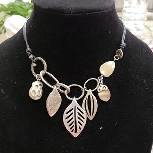 Chic Silver Leaf Charm Necklace. 16in long choker. Has 4in. long extender.....